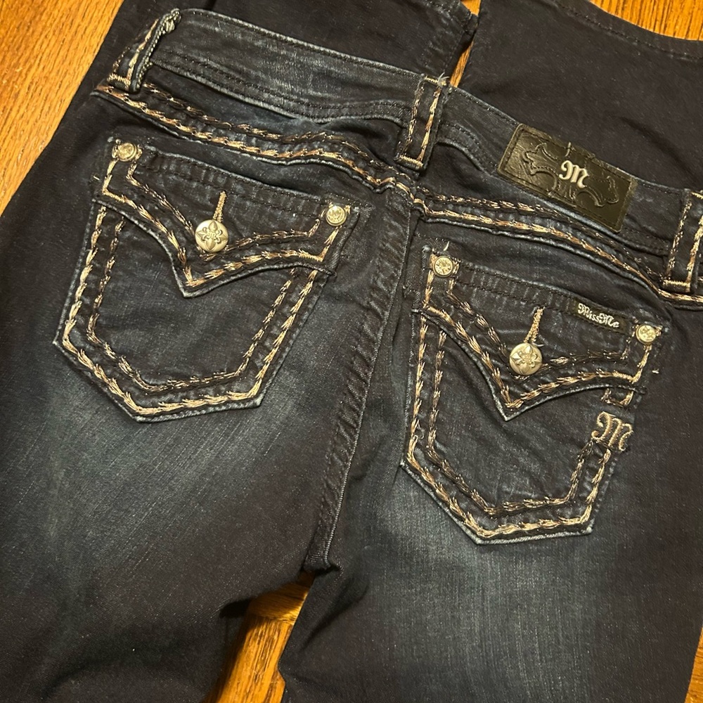 Miss Me Mid rise bootcut size 27